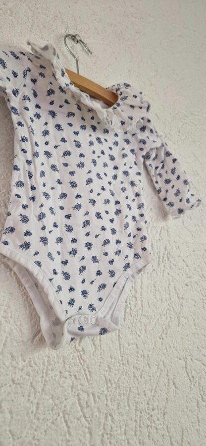 062 - Romper bloementjes blauw (1024bak)