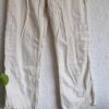 38 - H&M broek roomwit zakken (0225ros2)