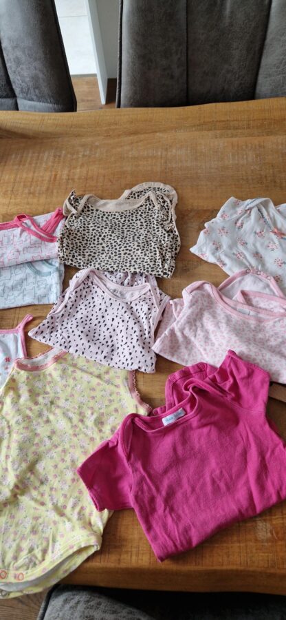 074 80 - Hema stapel rompers 11 stuks (0325nic)