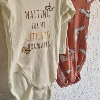 074 80 - Harry Potter rompers 2x (1125gro)