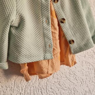 080 86 - Mintkleurig vestje met tuniekje (1125gro)