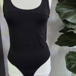 L - Kruidvat bodystocking zwart glad (0526prv)