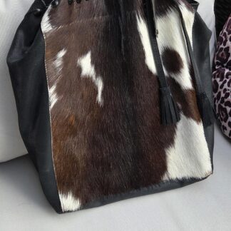 Unleaded cow bag koeientas leer